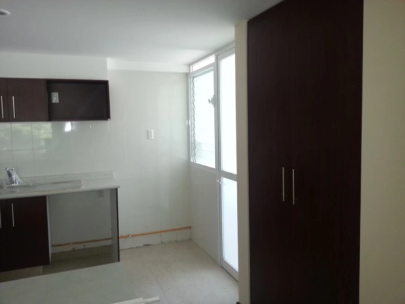 cocina compartida con área de lavado en depa La Roma